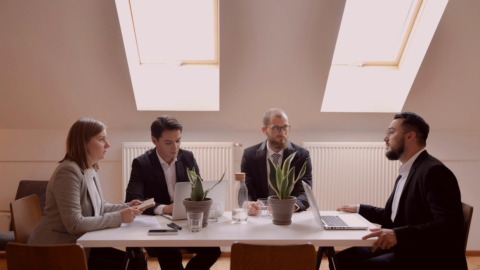 People in a professional event setting
